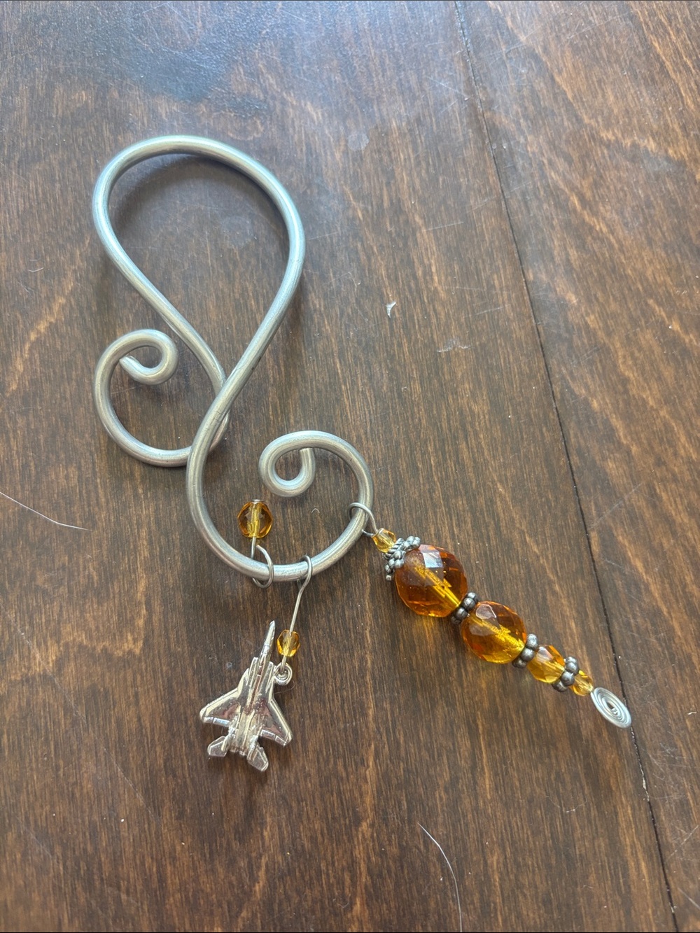 Sporto Silver-Tone Swirl Wine Charm with Amber Beads and Jet Plane